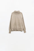 wide beige sweater with ribbed sleeves